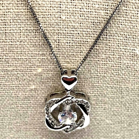 Sterling Silver Heart & Knot Pendant Necklace With Sparkling Cubic Zirconia - Picture 1 of 10